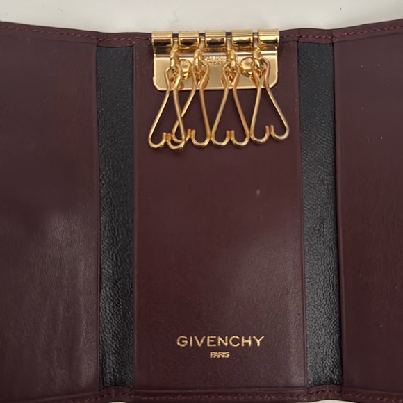 Givenchy 4 Key Holder. Color is of dark red  / brown - Picture 4 of 6